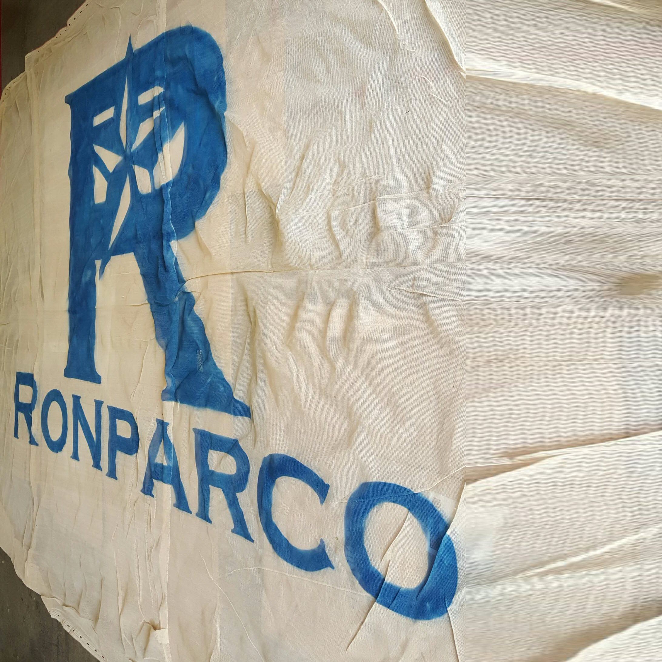 1 Logo Stenciled on a Tarp Used Tarp For Sale PDQuipment